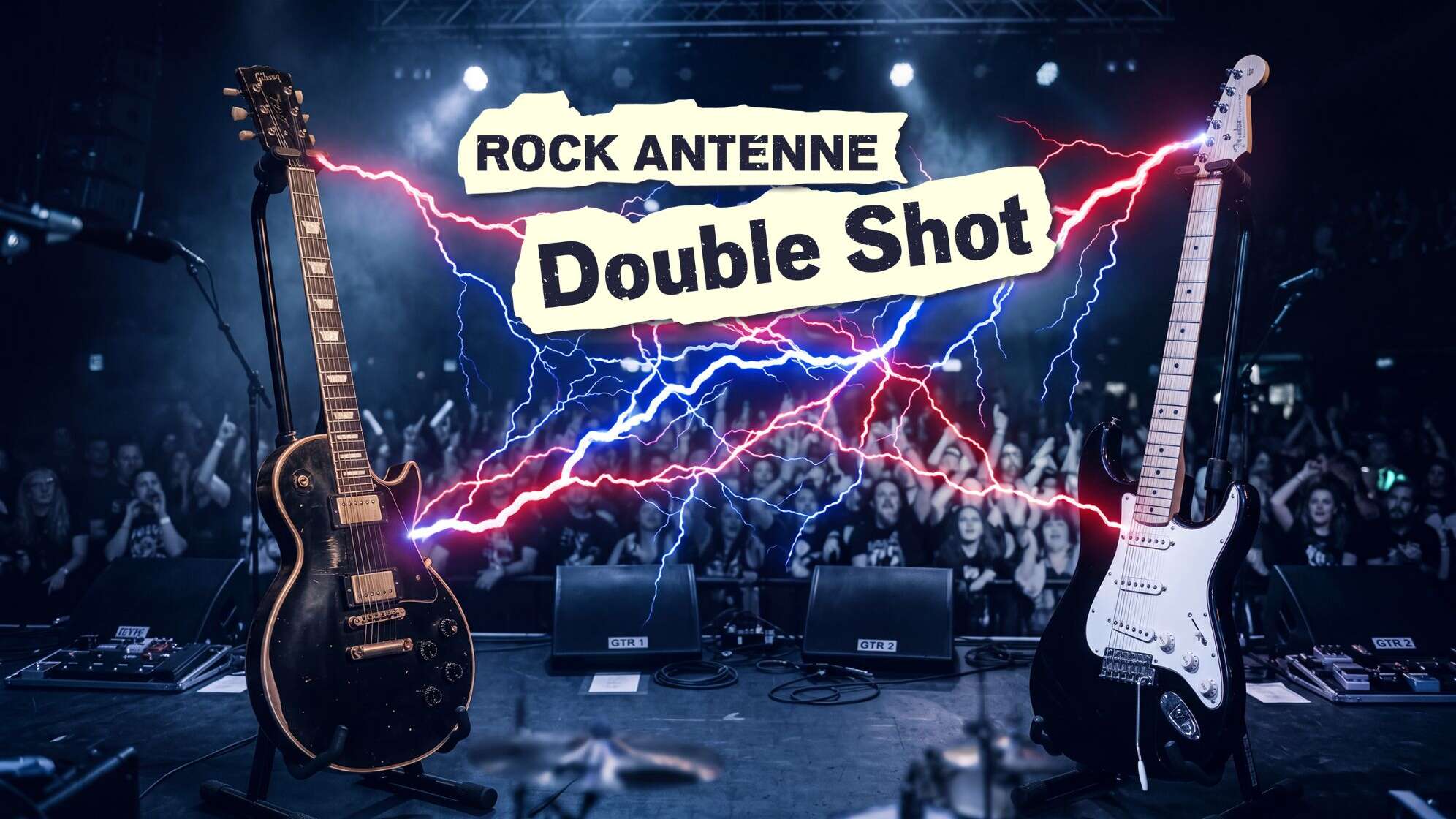Zwei E-Gitarren (schwarze Les Paul links, schwarze Stratocaster rechts) stehen auf einer Konzertbühne vor einer jubelnden Crowd in einem Rock-Club. Zwischen ihnen zucken rote und blaue Blitze. Ein Banner-Text über der Szenerie zeigt 'ROCK ANTENNE' und darunter 'Double Shot'. Auf dem Bühnenboden liegen Effektpedale und Monitore mit der Beschriftung GTR 1 und GTR 2.